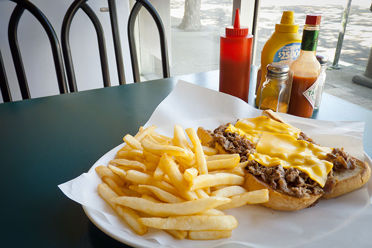 Eat your cheese steak by the window and make passersby jealous.